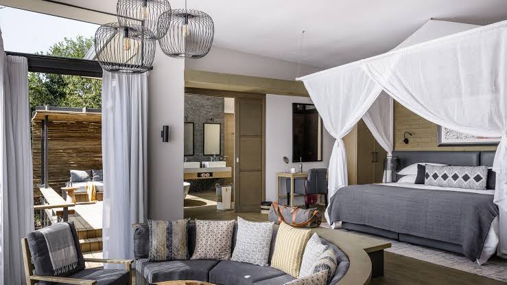 Sanctuary Olonana glass fronted suite on a private stretch of the Mara River, Masai Mara