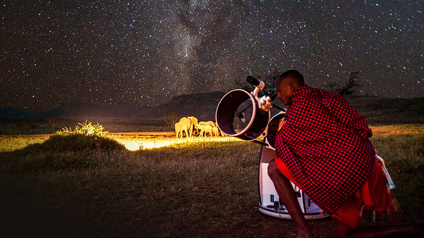 The Milky Way over a luxury tented camp under the equatorial night sky in Kenya