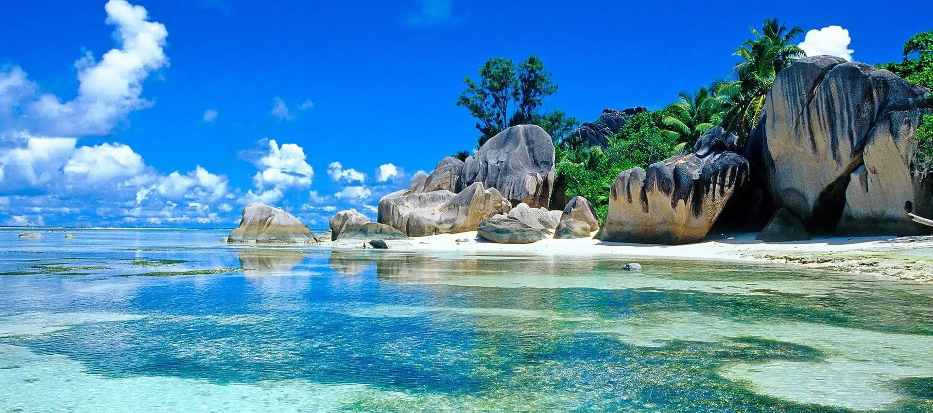Granite boulders and turquoise water in the Seychelles